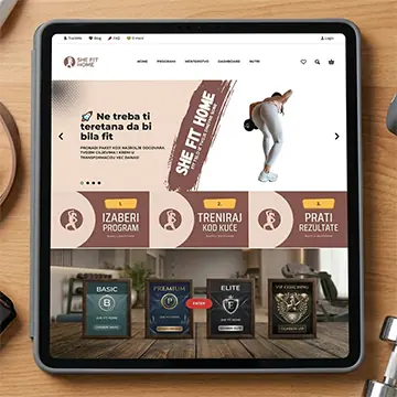 Online trening kod kuće za žene: She Fit Home platforma sa Basic, Premium, Elite i VIP coaching programima na tabletu